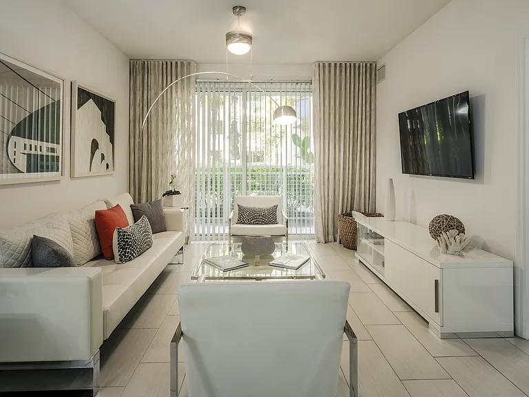 Light-Filled Living Area with Sliding Doors to Private Balcony