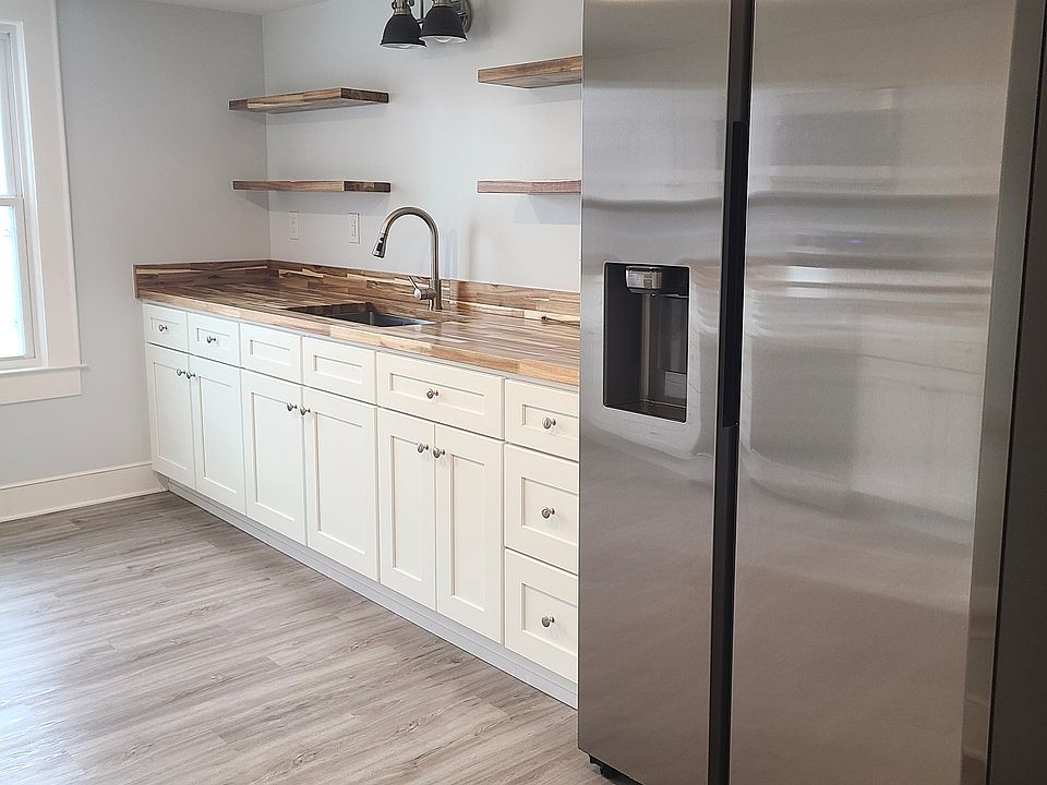 Drop in sink with floating shelves.
