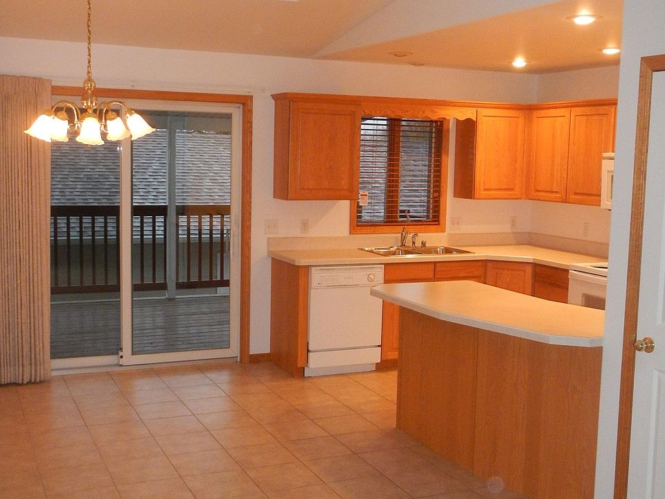 Large kitchen, dining area, bar, lots of cabinets, pantry cl