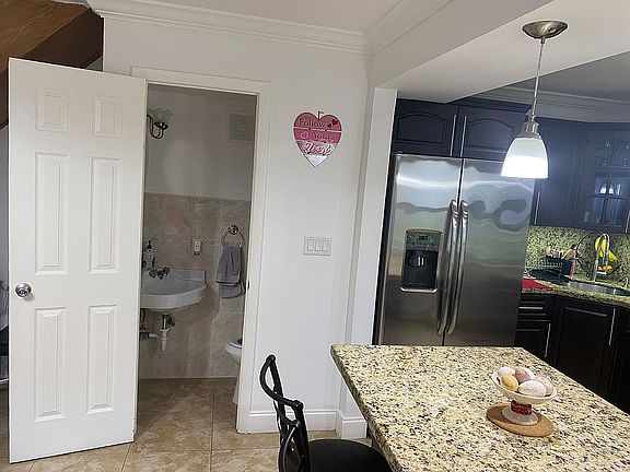3rd image of 1560 W 46th St #243