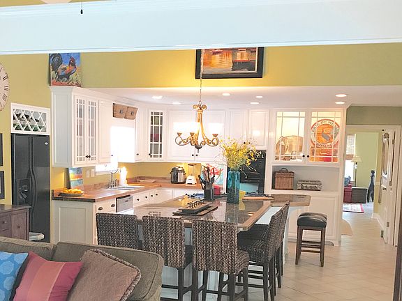 DELUXE KITCHEN OPENS TO DEN