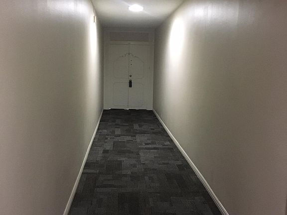 Private hallway approaching your new front door