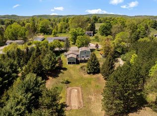 9477 S Cedar Rd, Cedar, MI 49621