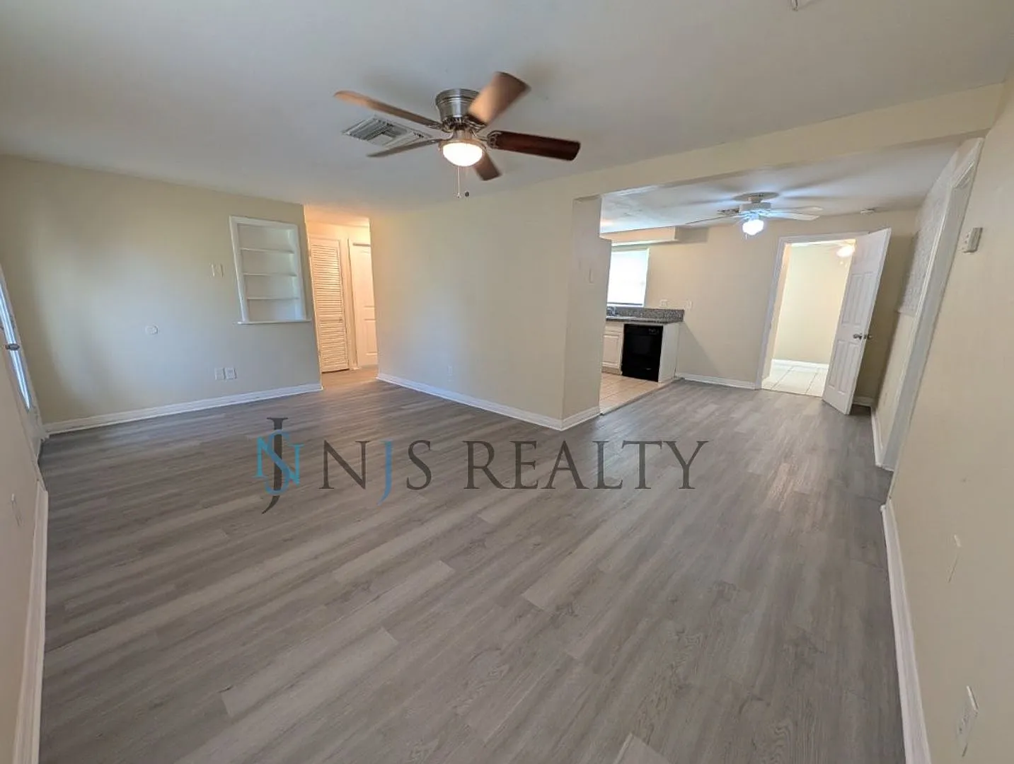 Newly Renovated 3/1/1 New Flooring, New Paint, Updated Kitchen & Bath, Fenced Yard.. A Must See!! — Photo 3