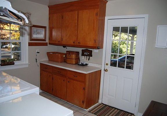 huge laundry room with storage
