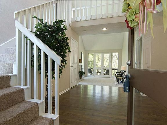 The view as you enter the home. Attractive flooring leading to the family room.