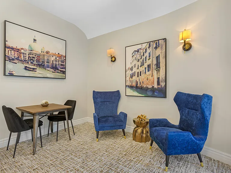 Enjoy the clubhouse's cozy sitting area, perfect for relaxing and socializing.