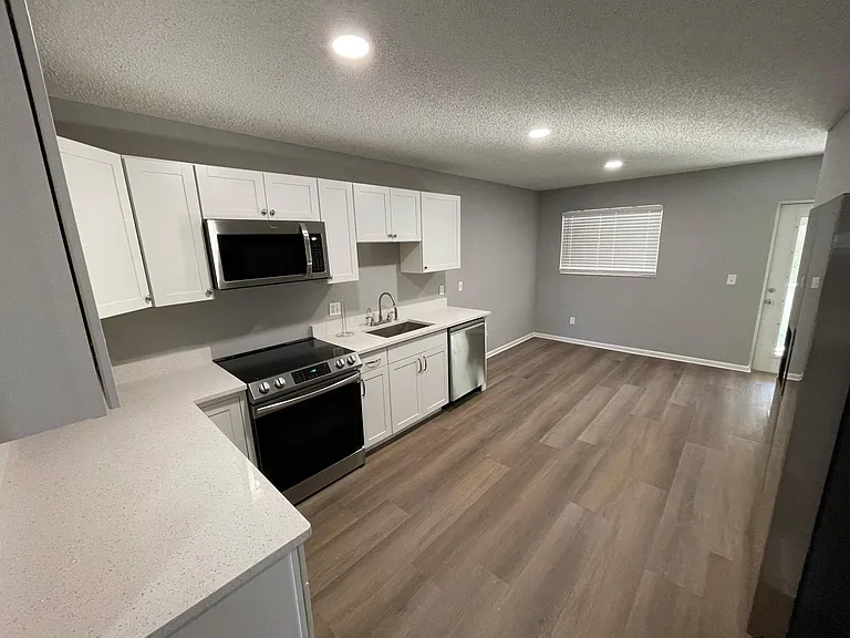 2497 NW Holiday Ct — Photo 3