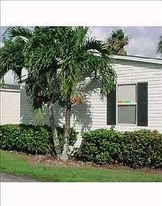 1st image of 100 NE 6th Ave Lot 216