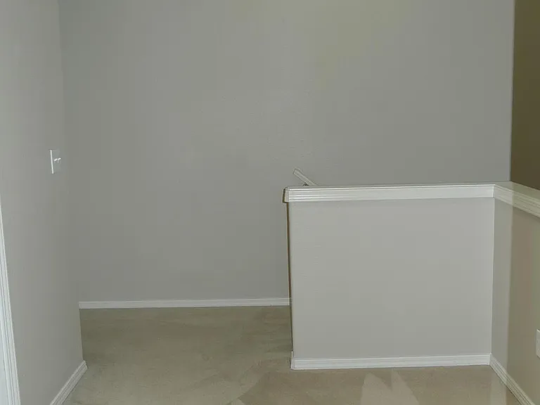 Computer den with vaulted ceiling and skyline