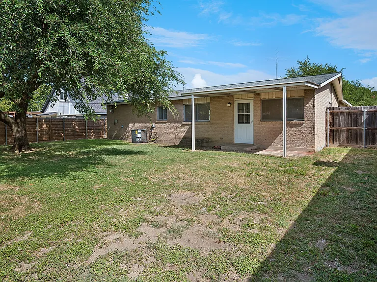Back view showing the covered patio.