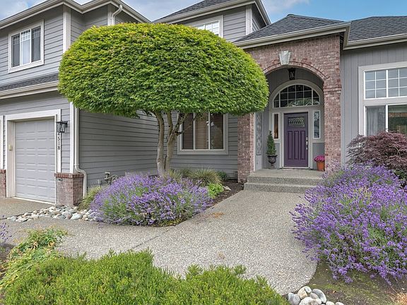 Inviting entry to this meticulously maintained 4 bedroom, 2 1/2 bath home with office, bonus room and 3 car garage.>