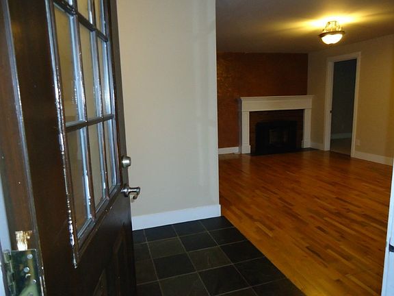 You are welcomed by a tiled entry. Turn left to the 3 extra bedrooms and right to the livingroom and master bedroom through the door way. Four bedrooms in total.