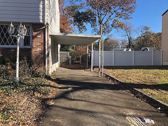 3 car driveway w/ carport