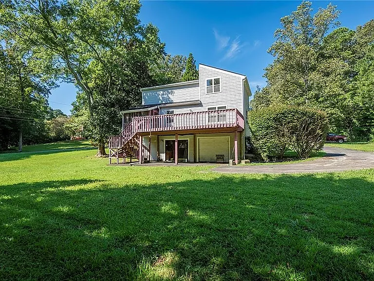 View of back yard and back of house
