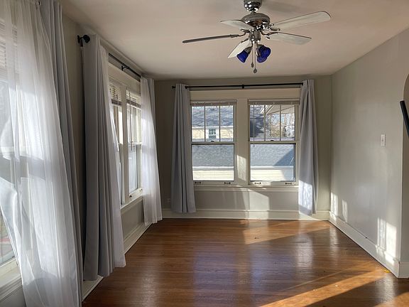Sunroom without Furniture facing west can't see book shelves.