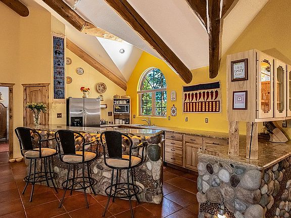 Kitchen with eat in bar