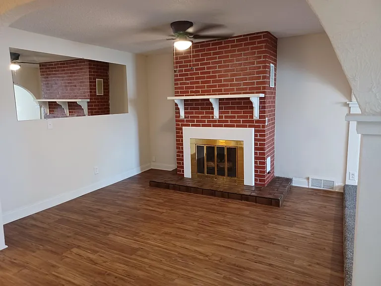 fireplace and new wood flooring