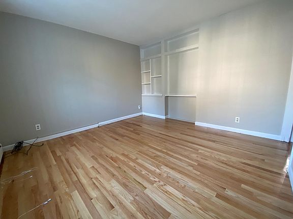 Living room with in-wall shelving