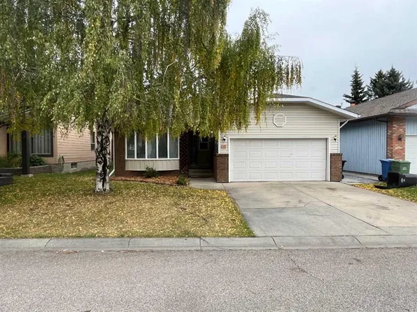 12 W Woodmont Rise SW, Calgary, AB T2W 4L5