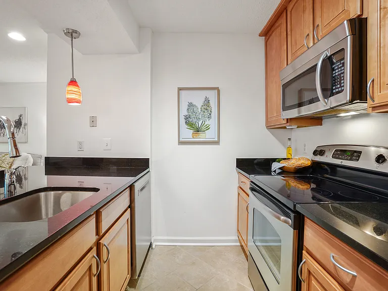 Sink and dishwasher in the peninsula.