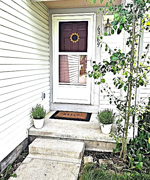 Front entry door with storm door.