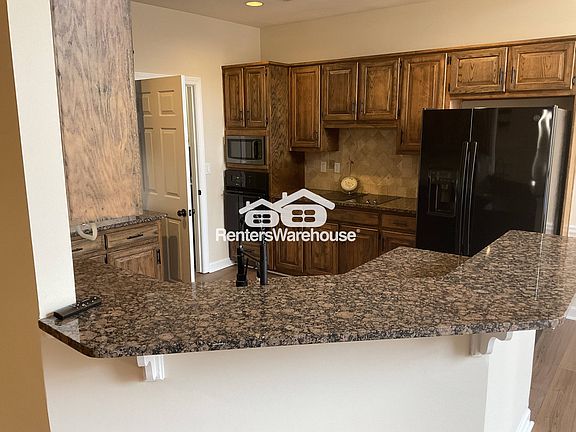 4th image of 215 Blue Spruce Cir
