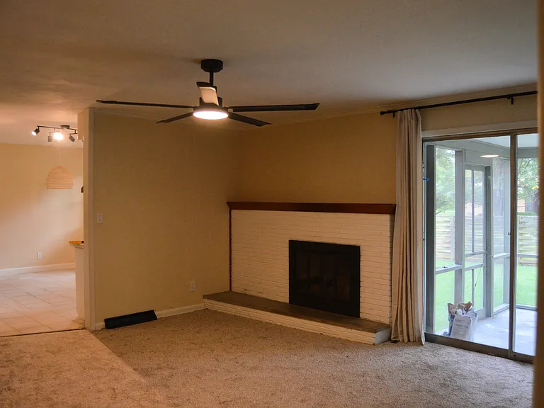 Second Living Space; Leads to Outdoor Screened-In Patio Room