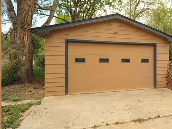 Garage, big tree is gone