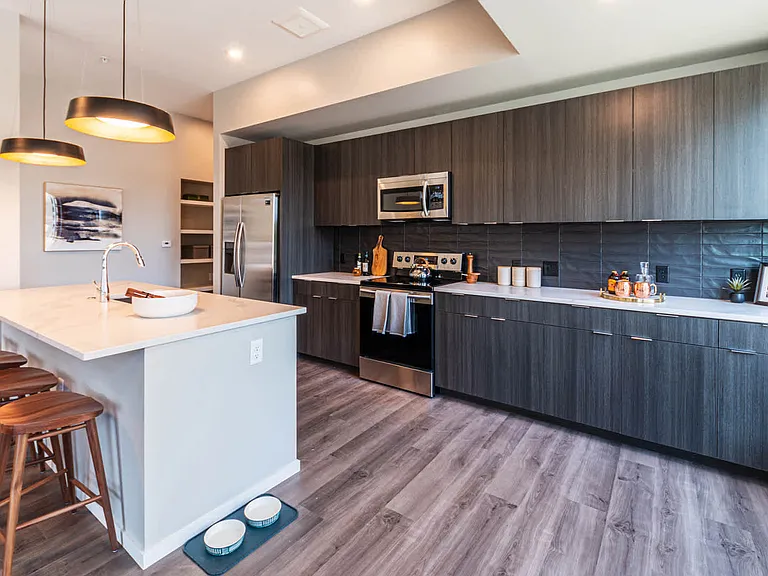 Kitchen with Stainless Steel Appliances and Breakfast Bar
