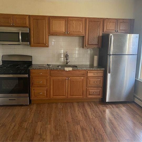 Newly renovated granite countertops and stainless steel appliances