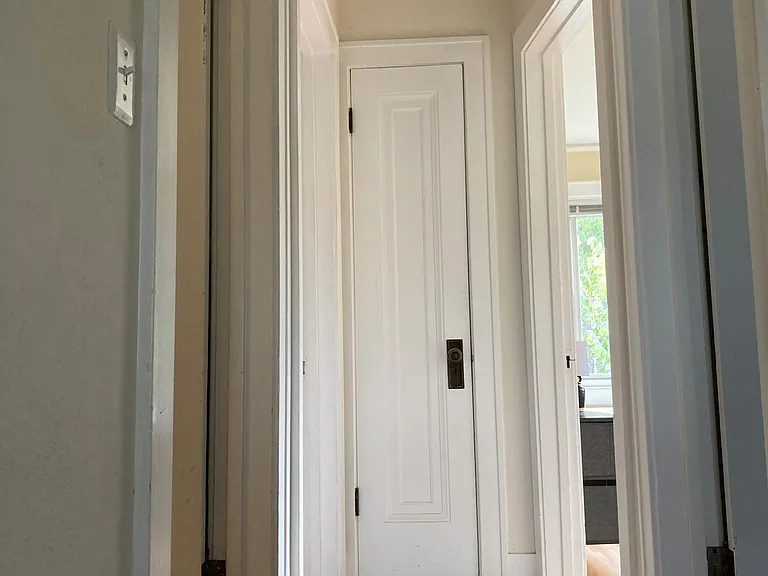 View of the second floor hallway leading to bathroom, three bedrooms, and the linen/storage closet.