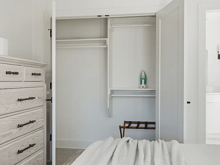 Bedroom 2 with a king bed and ensuite bath. Located on the 1st floor. Tastefully decorated with high-end modern furnishings and thoughtful touches to make your stay as comfortable as possible.