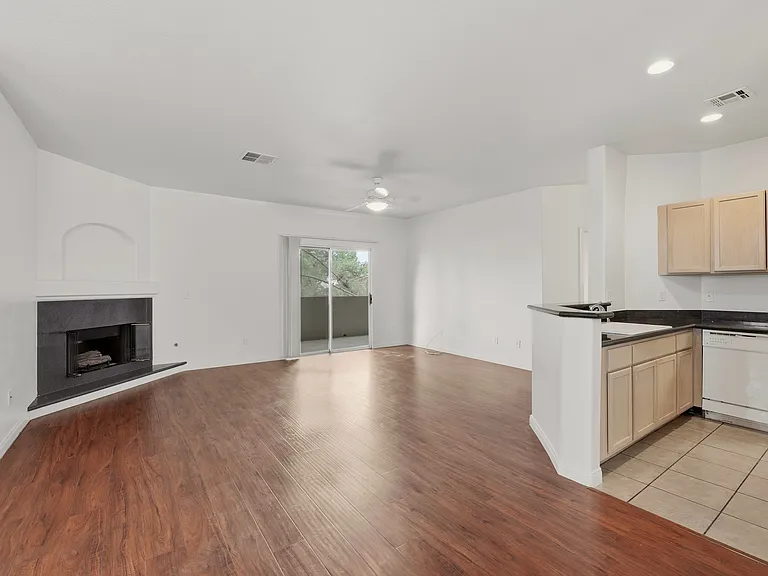 #GuardianRealty 2050 W Warm Spring #3722 Resort Community Rental Living room fire place_07202026