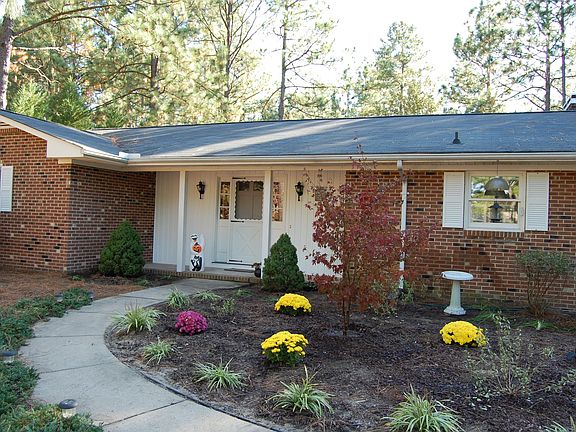 Brick Ranch with great flower beds