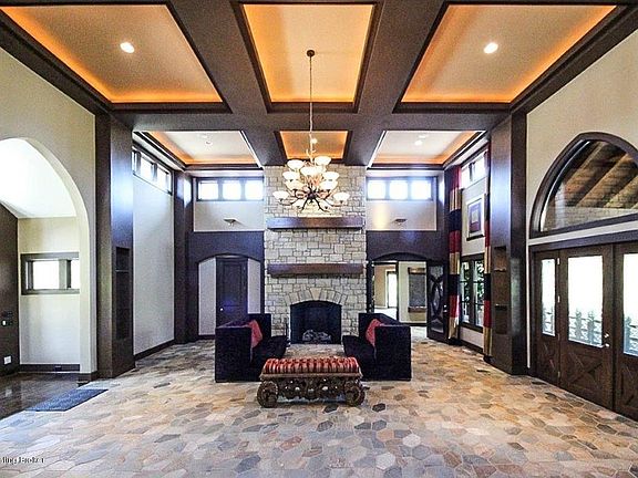Great Room with 23' coffered ceilings