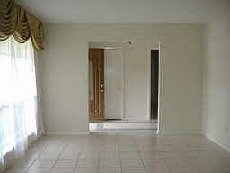 Step into this bright formal dining room and den! You can reverse these rooms if needed, but any way
