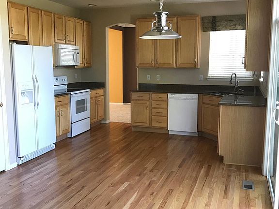 Kitchen, with granite countertops, new oven and microwave.