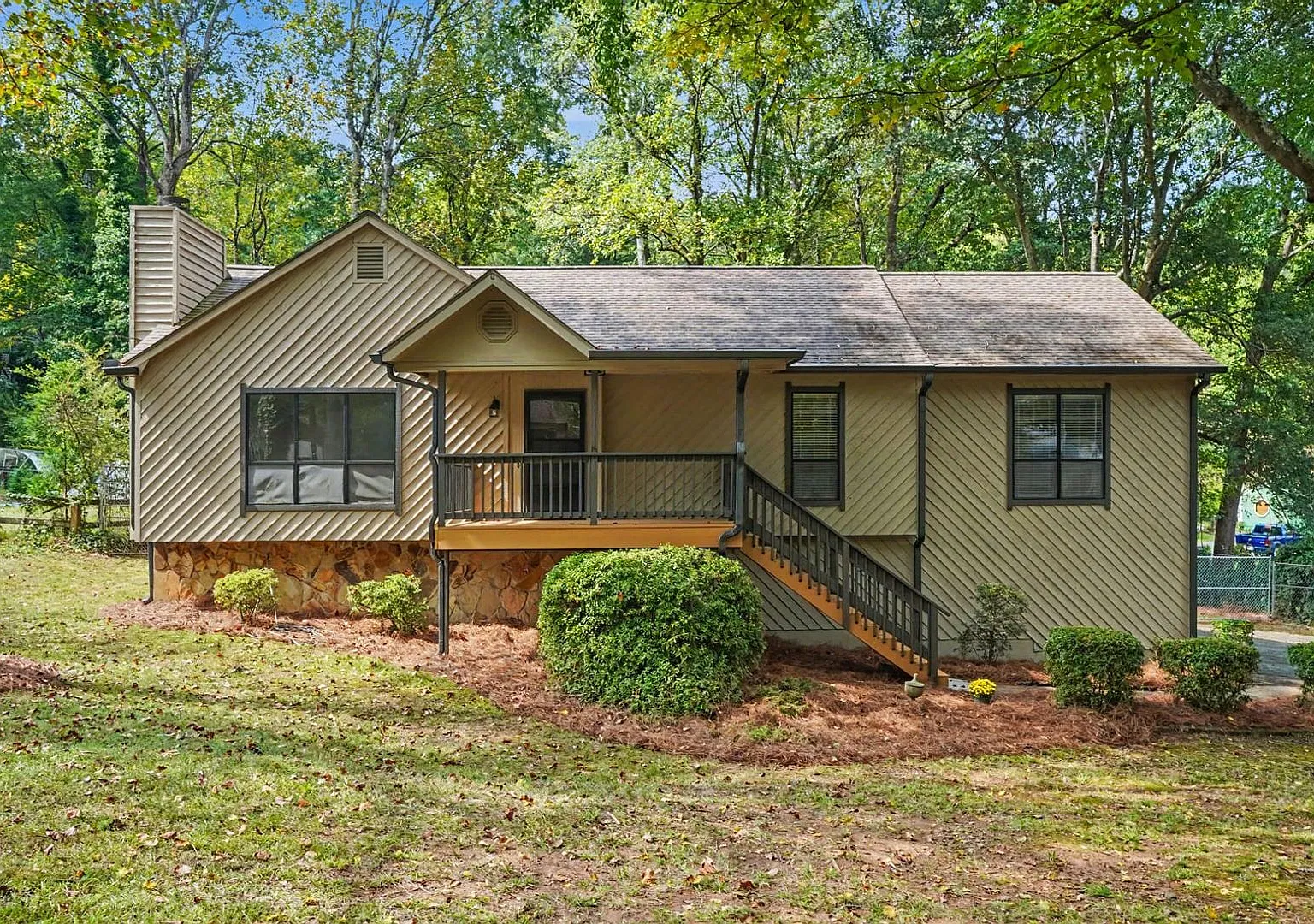 East Cobb Split Level with a Finished Lower Level and Two-Car Garage — Photo 1