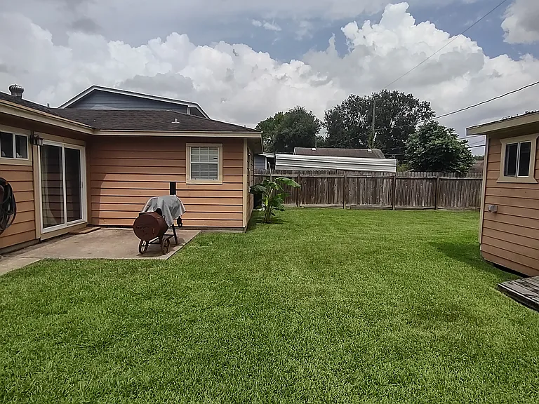 Back of the house with yard