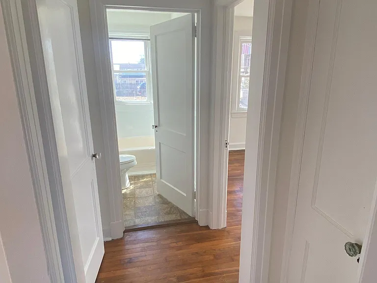 Hallway with two storage closets
