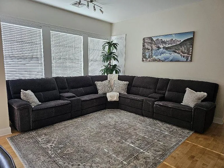 Spacious living room filled with natural light