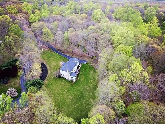 Large wooded lot allows for privacy and room for pool, tennis etc.