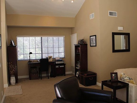 Living Room or Office Area Flooring and paint has been updated since this photo was taken.