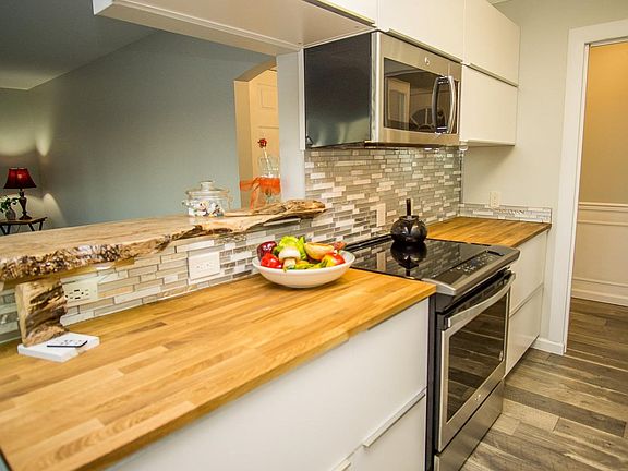 New stainless steel appliances and bucher block counter top