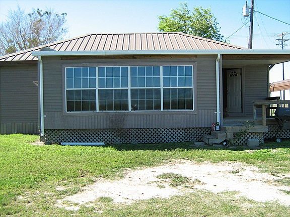 Water side of master bedroom, covered porch