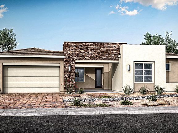 A modern, single-story house with a stone facade, a tiled roof, and a well-landscaped front yard fea