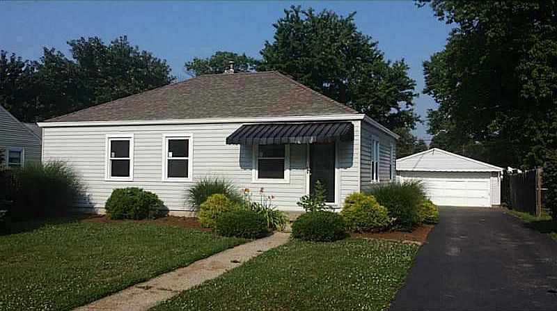 Exterior Front. Newer Roof with new windows.