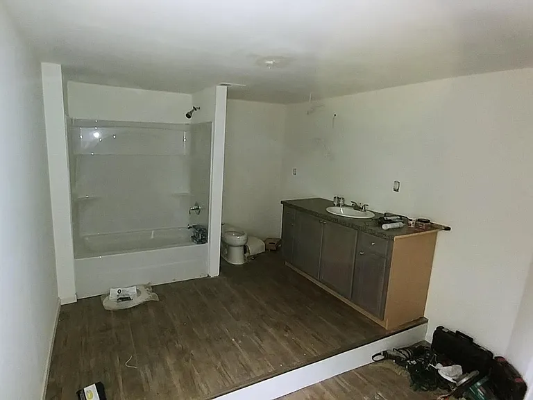 Brand new step-up bathroom, with new vanity, shower & lighted make-up area