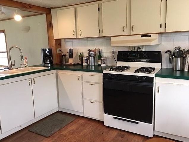 Updated kitchen with hardwood floors